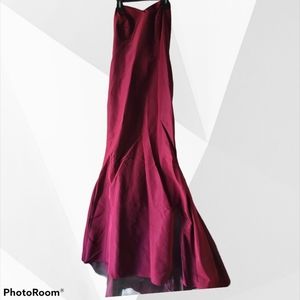 Red strapless mermaid dress with train